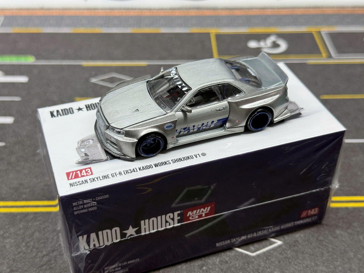 cHASE Kaido House Mini GT Nissan Skyline GT-R R34 Shinjuku V1 Silver 1/64 scale KHMG143 (Copy)
